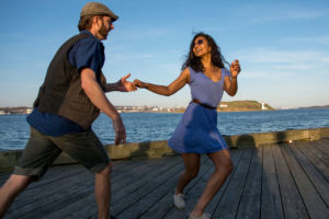 Couple Swing Dancing at Waterfront