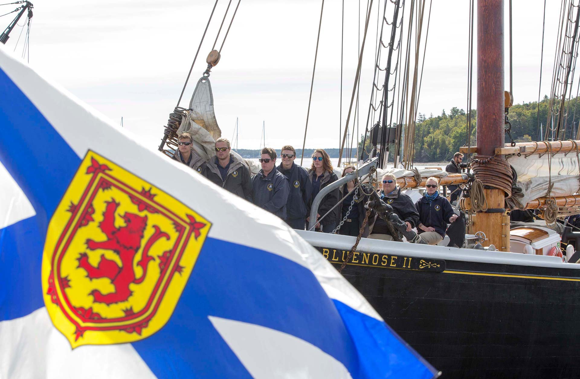 Nova Scotian Flag in front of Tall Ship