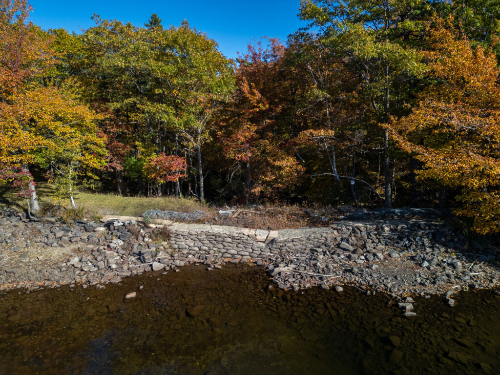 A photo of the Williams Lake dam in Halifax, NS on a clear fall day.